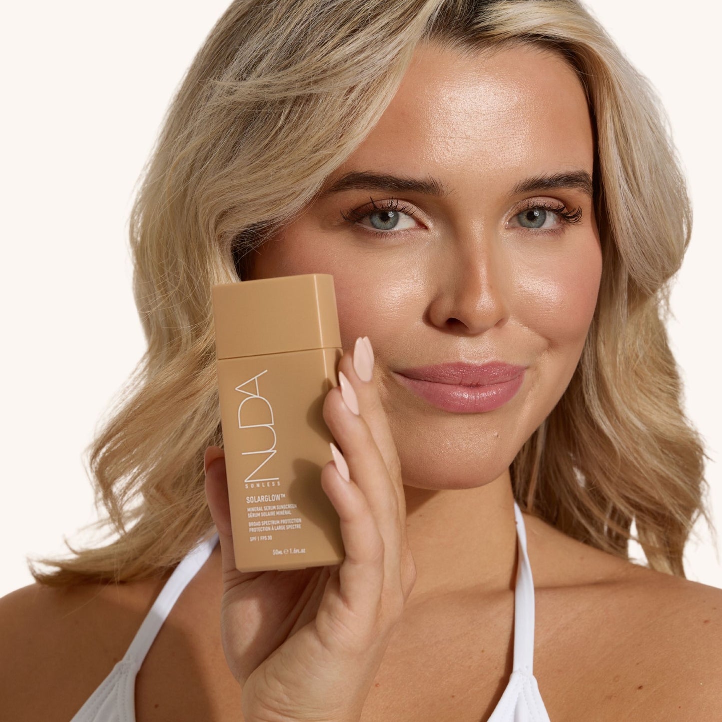 Solar Glow Crème solaire teintée NUDA